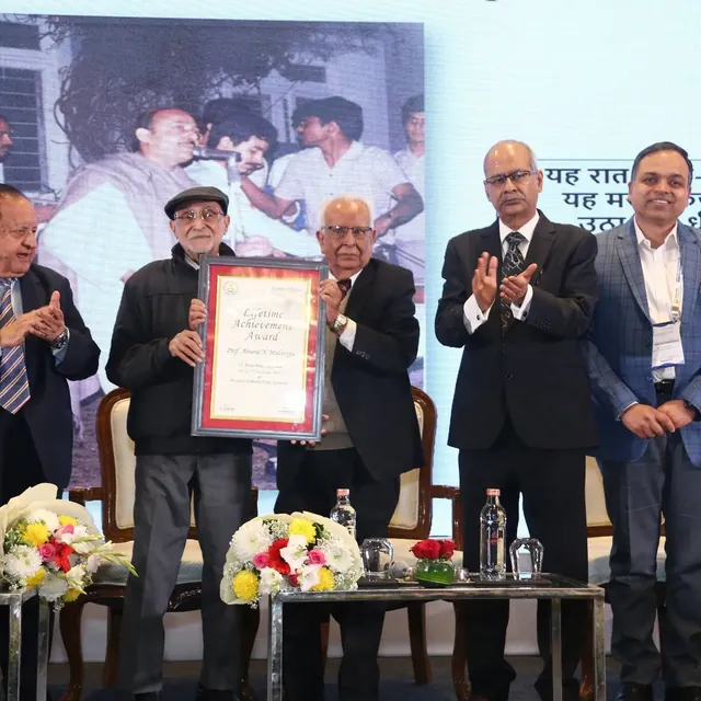 Awards moment at the XIII Symposium — December 2025